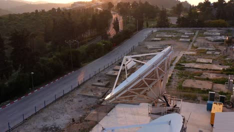 satellite dish facility at sunrise