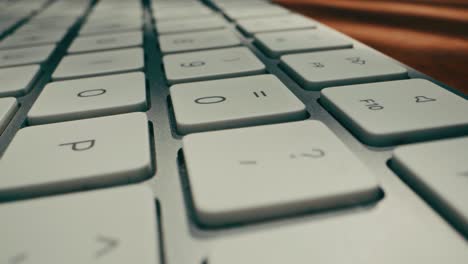 this is a detailed view of a sleek, modern keyboard that showcases its smooth keys and elegant overall design