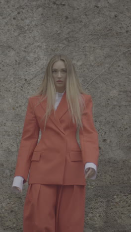 woman in orange suit