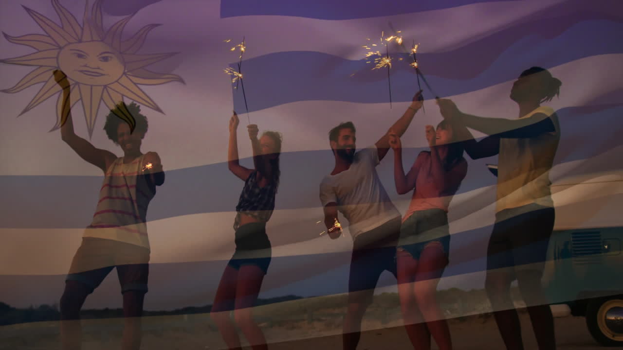 Group of friends celebrating with sparklers over Uruguay flag animation