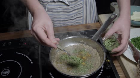 adding spices to pan with cafe paris butter mix, meat sauce