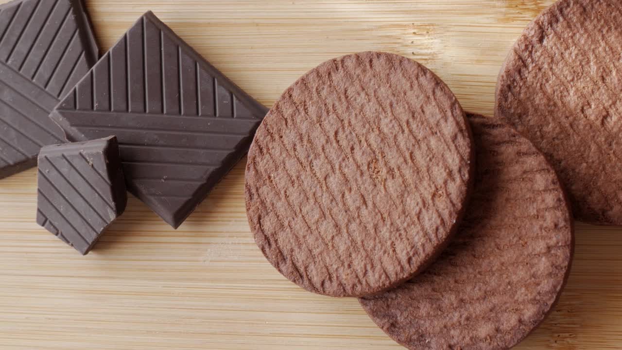 Chocolate biscuits with a mix of dark and milk chocolate, showing textured wafers and bites