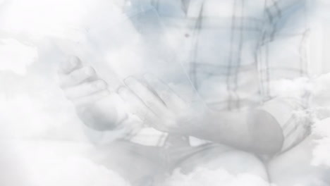 animación de nubes blancas que cubren al hombre caucásico leyendo un libro