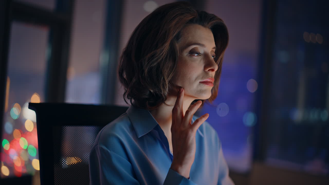 Startuper typing laptop night office closeup. Serious woman writing email