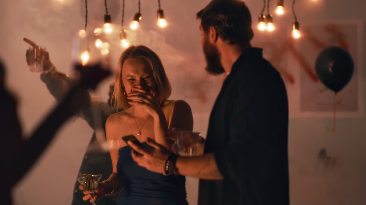 Couple and Friends at a Night Party