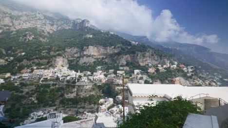 vast lush green scenic city in mountains | positano italy scenic summer cliffside immersive travel tourism mountainside, europe, walking, shaky, 4k