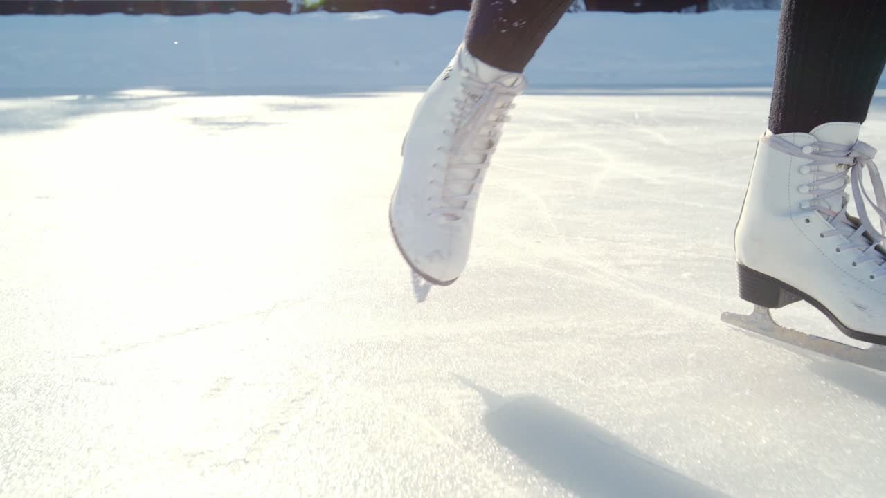 Woman Ice Skating on a Sunny Day