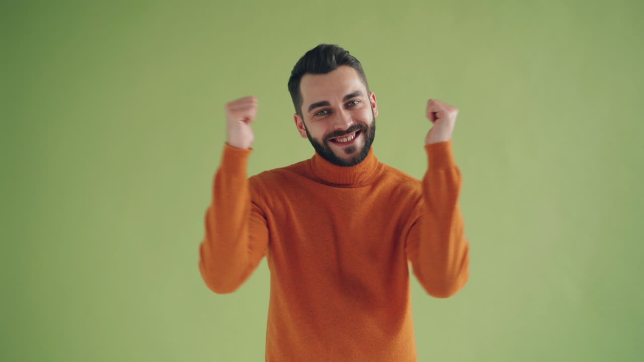 Happy Man in Orange Sweater