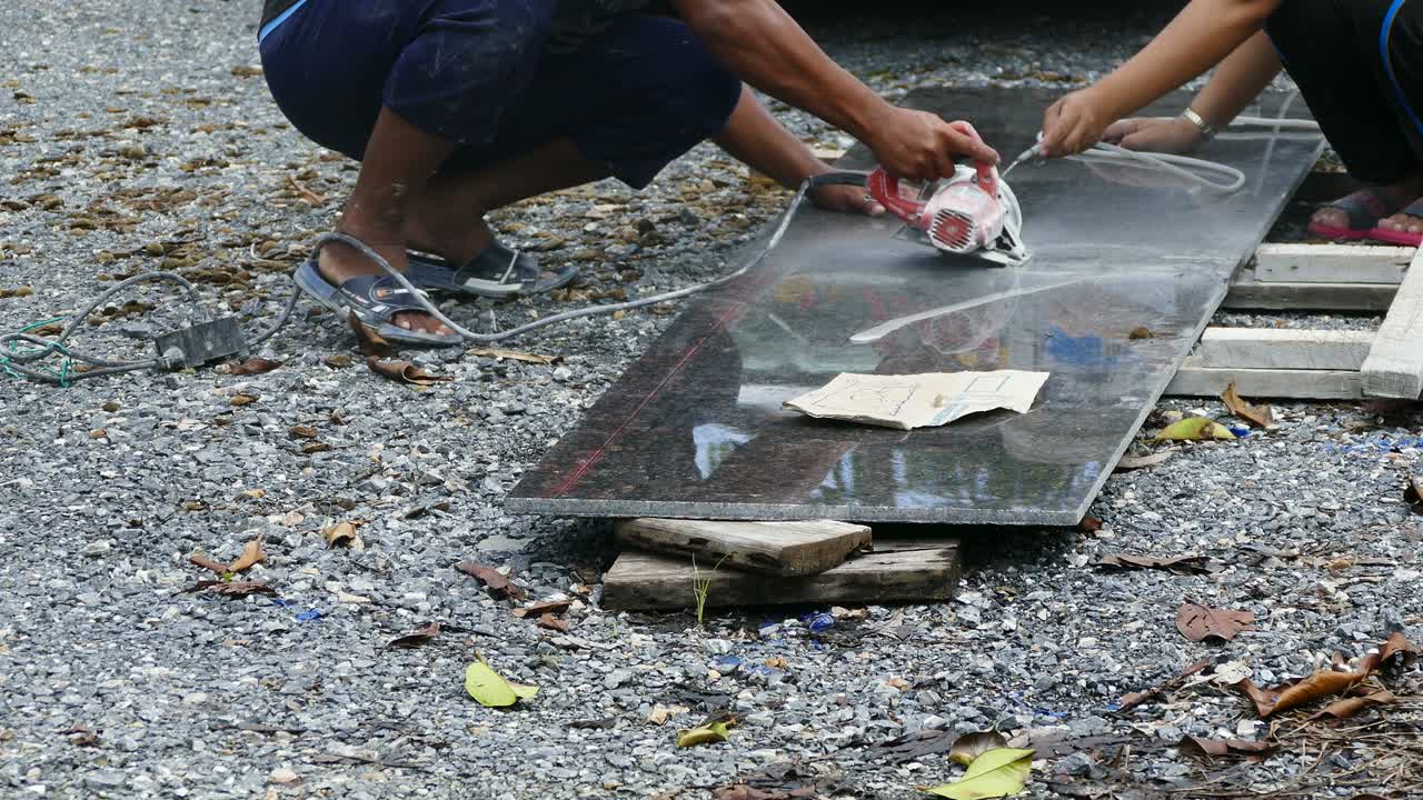 Man cutting granite stone