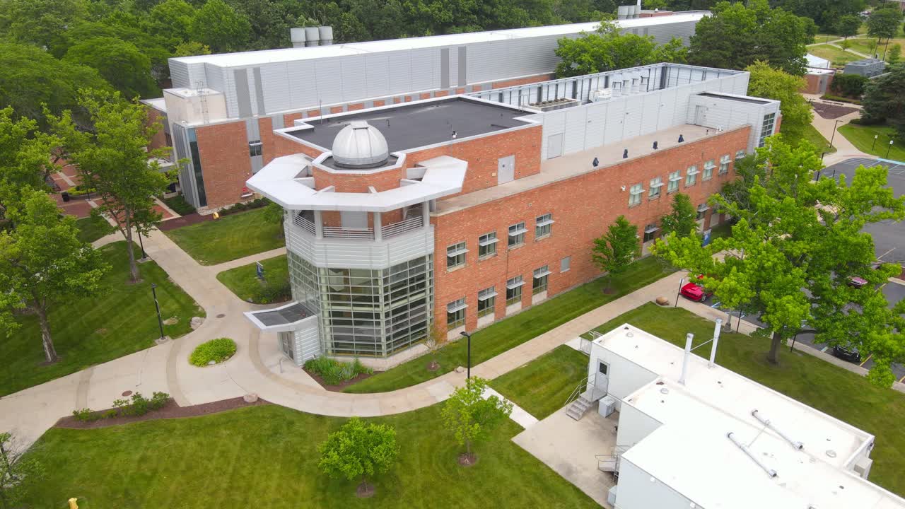University of Michigan Dearborn building exterior, aerial orbit view