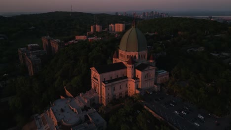 drone shot over saint joseph oratory at sunset in montreal quebec canada during summer