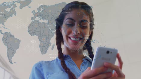 Animation-of-geometric-shapes-on-map-over-low-angle-view-of-smiling-biracial-woman-using-cellphone