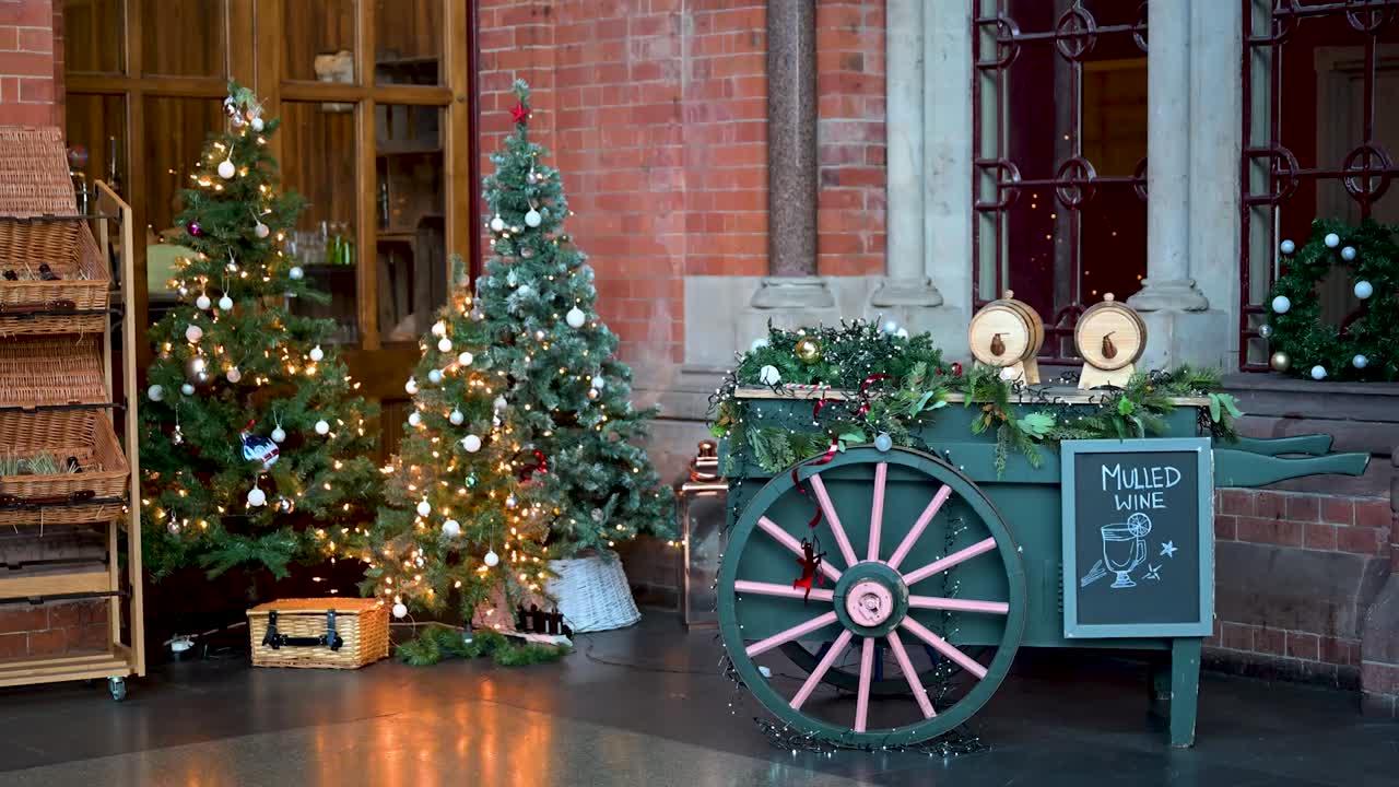 Cup of mulled wine resting at St Pancras International creating a warm festive pause during winter travel
