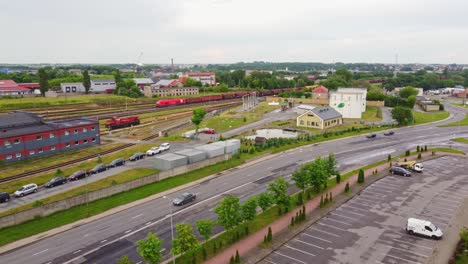 cargo train with wagons arriving in train yard,
