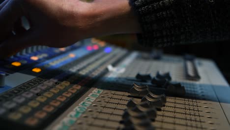 Mixing-music-on-a-recording-studio-mixing-desk