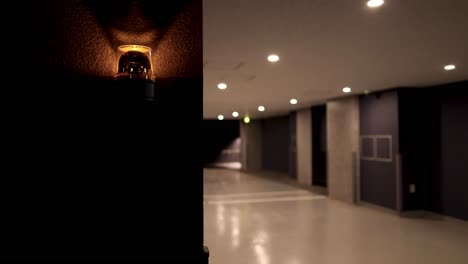 sequence of an indoor area lighting up gradually