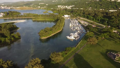 tilt up drone shot of yachts at american memorial park