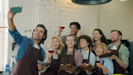 group photo of culinary students at wine tasting event