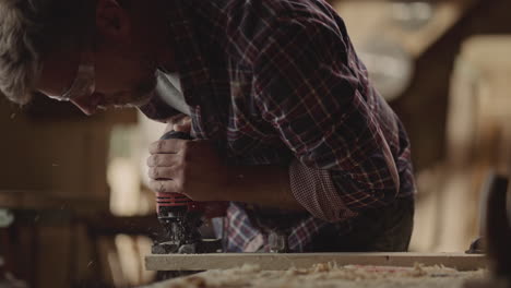 woodworker using power tool