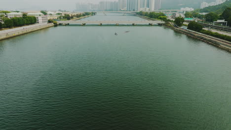 Stunning-drone-shot-approaching-a-bridge