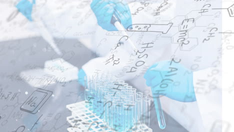 chemical formulas and laboratory experiment animation over scientists working with test tubes