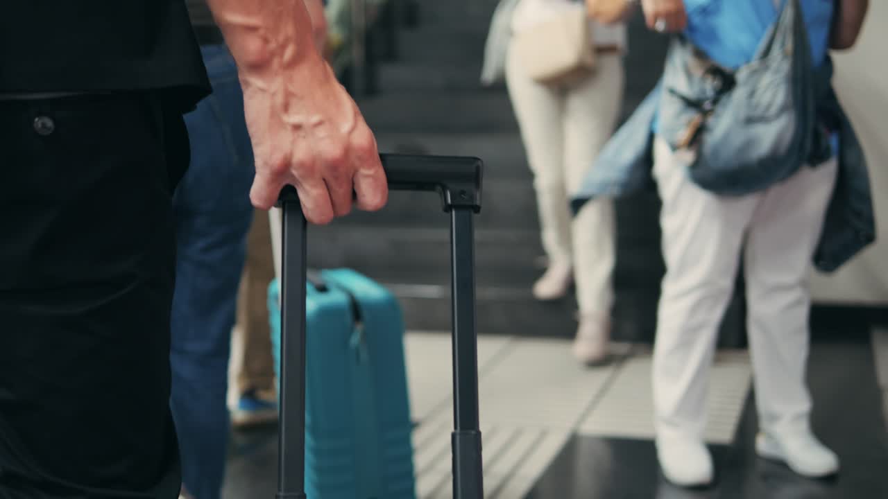Tourist man with suitcase baggage in spain, A traveler with luggage suit jacket on business street go to a hotel, business office, airport terminal, enjoying the vibrant atmosphere