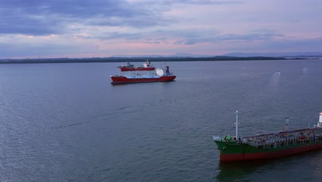 aerial view of gas lpg tanker ships at the port of balikpapan in kalimantan, indonesia - drone shot