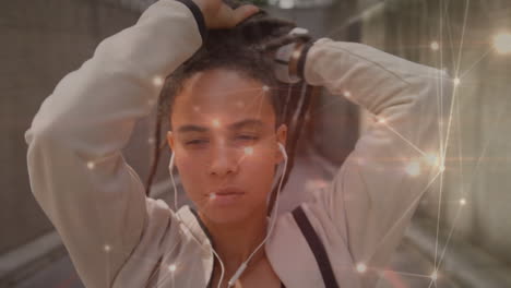 animación de redes de conexiones sobre mujeres atando rastas y haciendo ejercicio en la ciudad