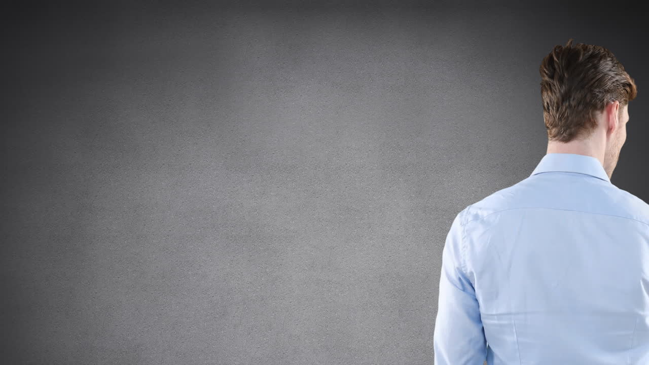 Animation of rear view of caucasian man touching invisible screen on grey background with copy space