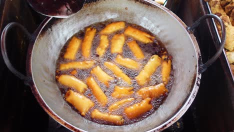 deep fried snacks being prepared