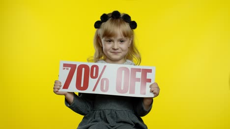 Child-girl-showing-Up-To-70-percent-Off-inscription,-rejoicing-discounts-for-online-shopping-sales