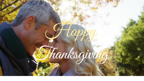 Smiling-and-embracing-outdoors,-couple-celebrating-with-Happy-Thanksgiving-animation