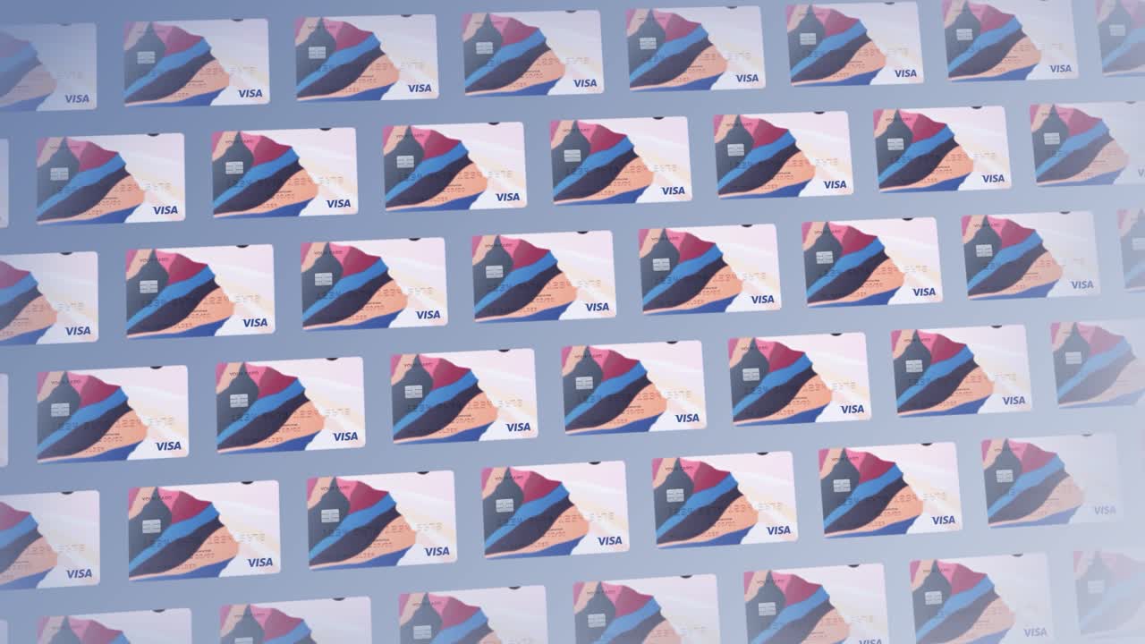 un primer plano de varias tarjetas de crédito visa con un diseño abstracto