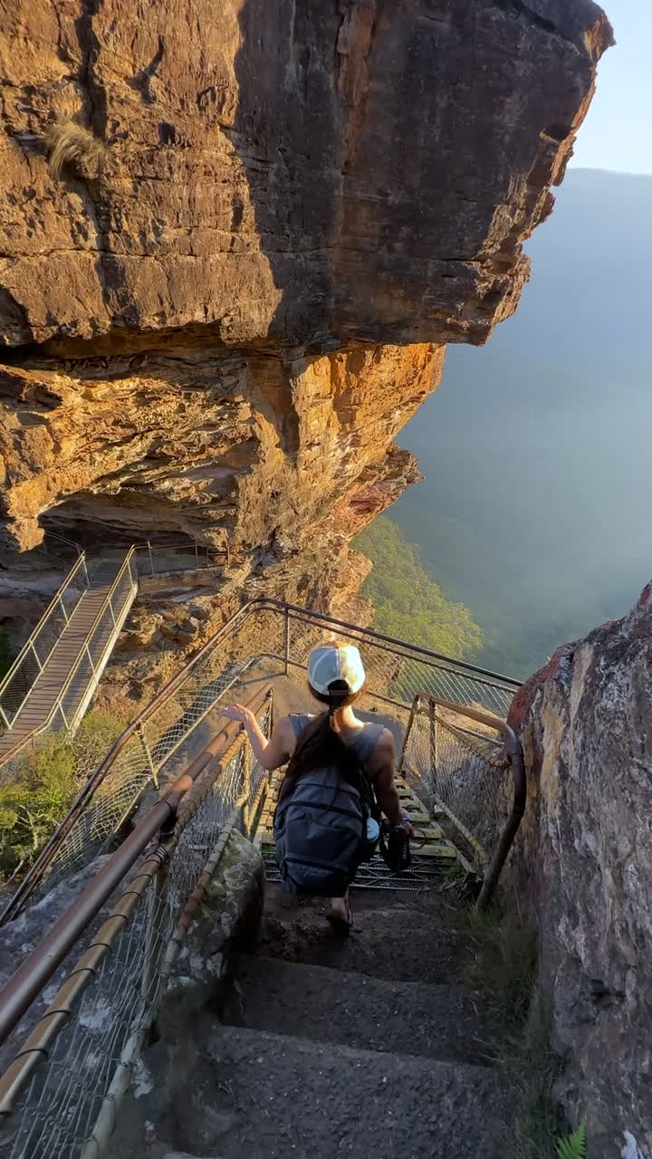 Vertical View of Woman on Giant Stairway, Viewpoint of Blue Mountains National Park, Australia