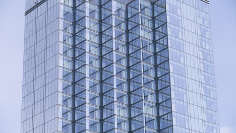 tight shot of a glass high rise