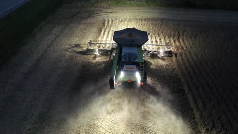 night harvest with combine harvester