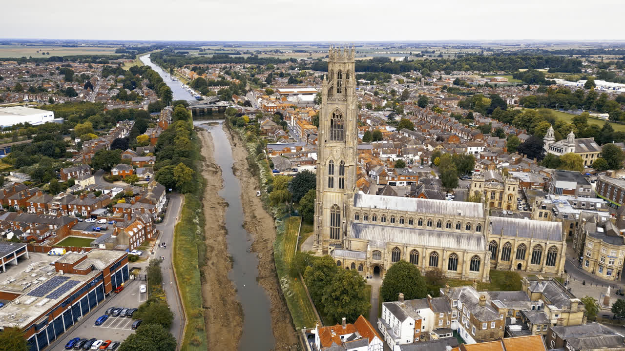 scenic beauty of Boston, Lincolnshire, in mesmerizing aerial drone footage: Port, ships, Saint Botolph Church , Saint Botolph's Bridge
