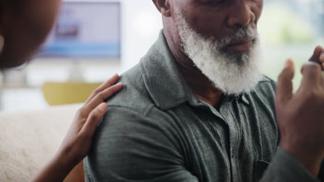 caregiver supporting elderly person