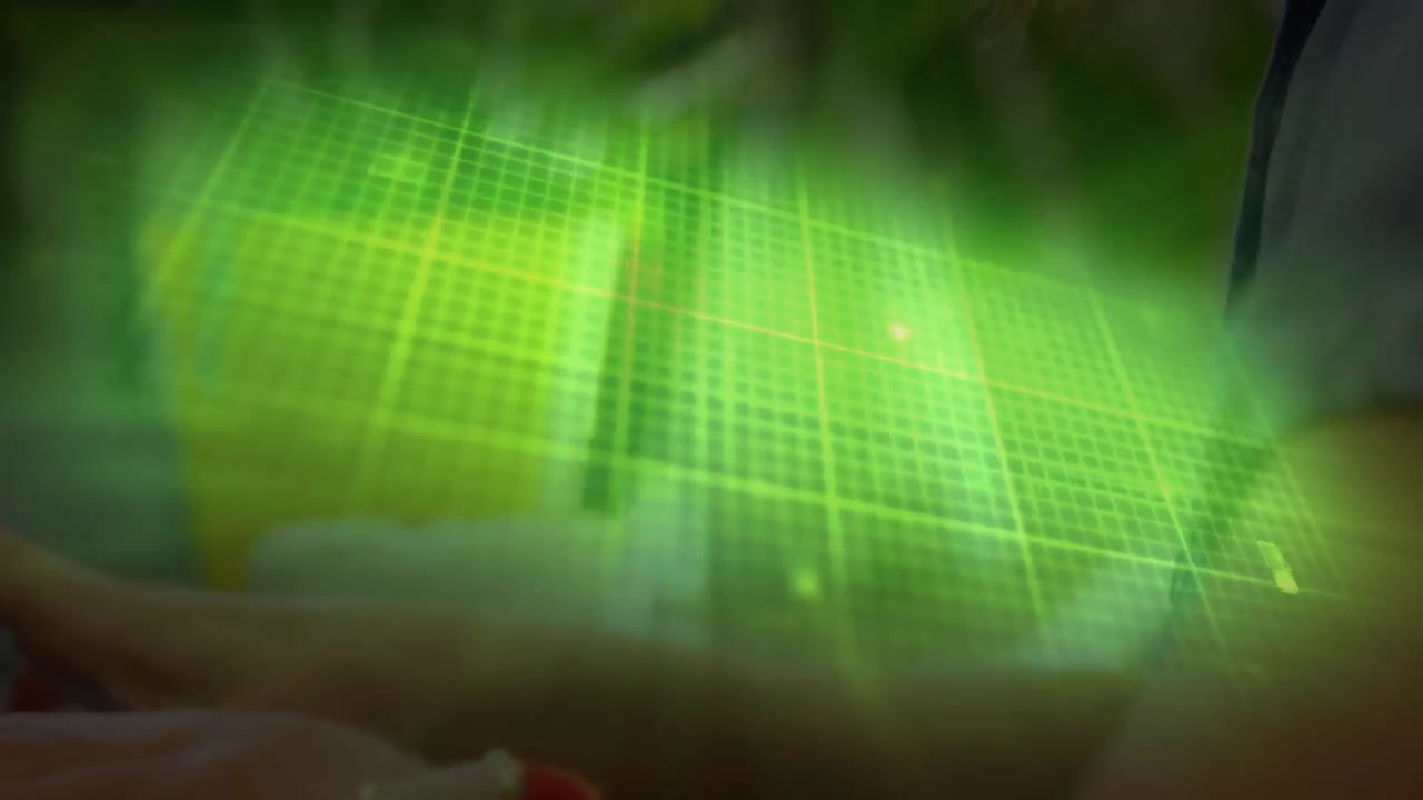 Animation of isoelectric line over caucasian businesswoman using laptop in office
