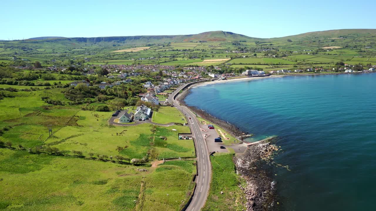 Ultra-wide, advancing aerial video of the Antrim Coastal Route on a bright and sunny day. Filmed in Ballygally in 4K, 60FPS and with Rec800 color.