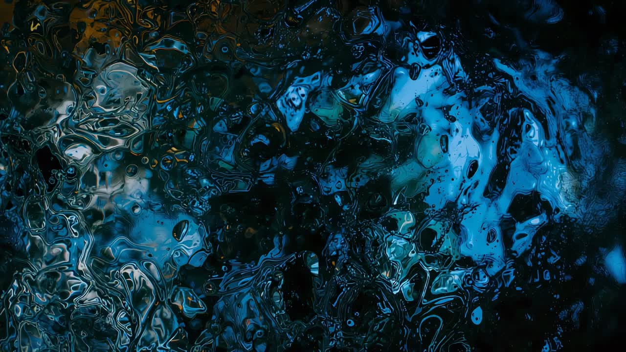 Falling rain, wet glass revealing droplets coalescing at window with blue teal amber lights