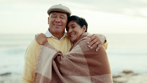 senior couple, hug and happy at the beach