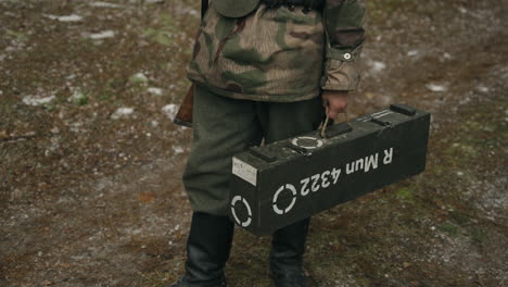 wwii soldier with equipment in a forest setting