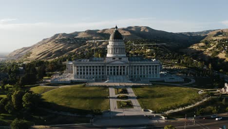 orbiting drone shot of the utah state capitol building