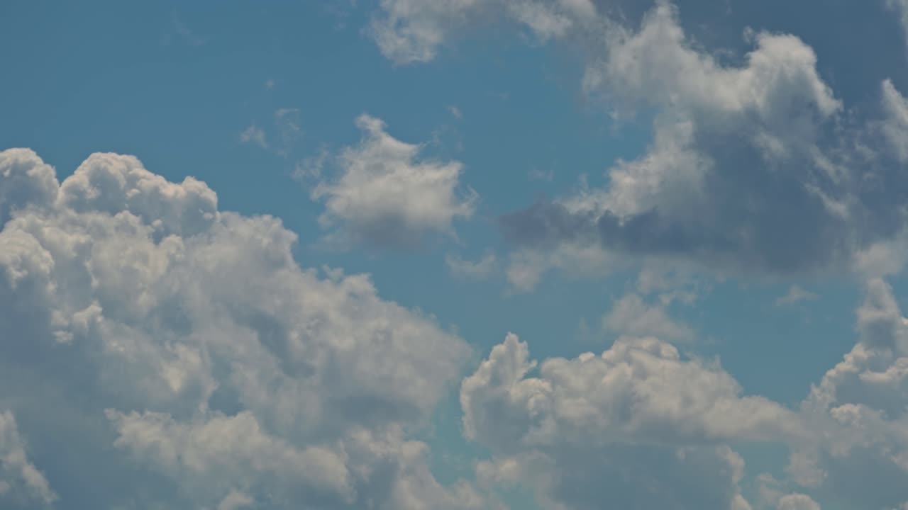 Clouds floating in the sky during a bright day