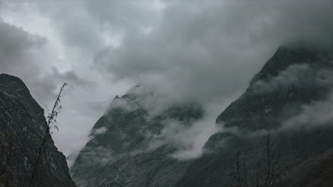 time lapse of clouds rolling through mountain peaks in the himalayas, nepal