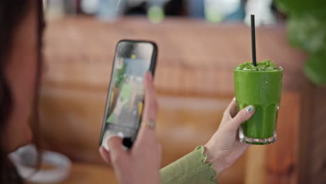 Phone-screen,-photography-and-green-juice