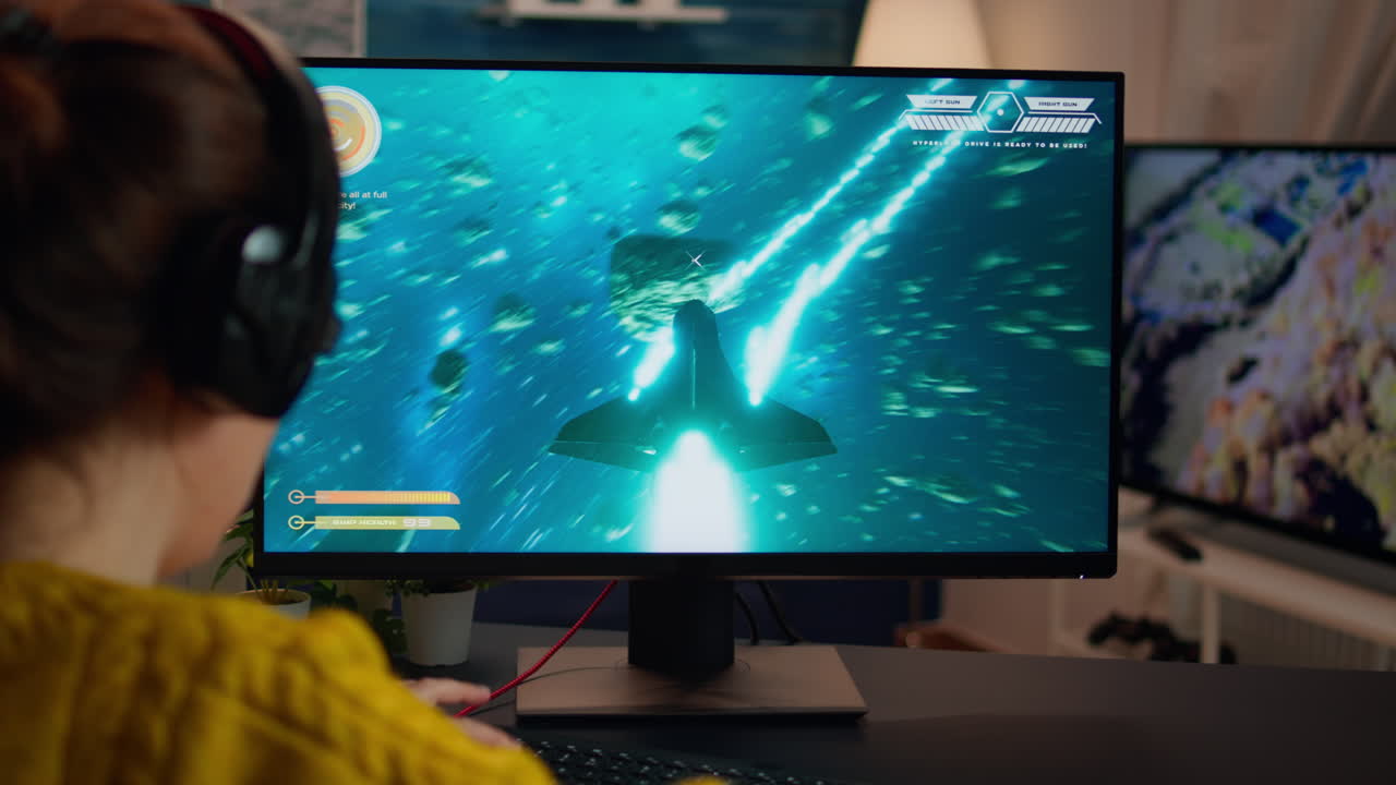 Back view of professional online gamer woman playing shooter game
