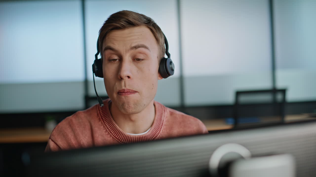 Joyful man assistant speaking computer in data center closeup. Smiling operator