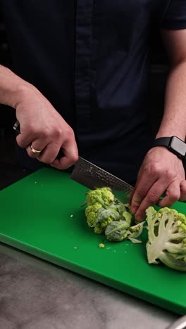 chef preparing green cauliflower